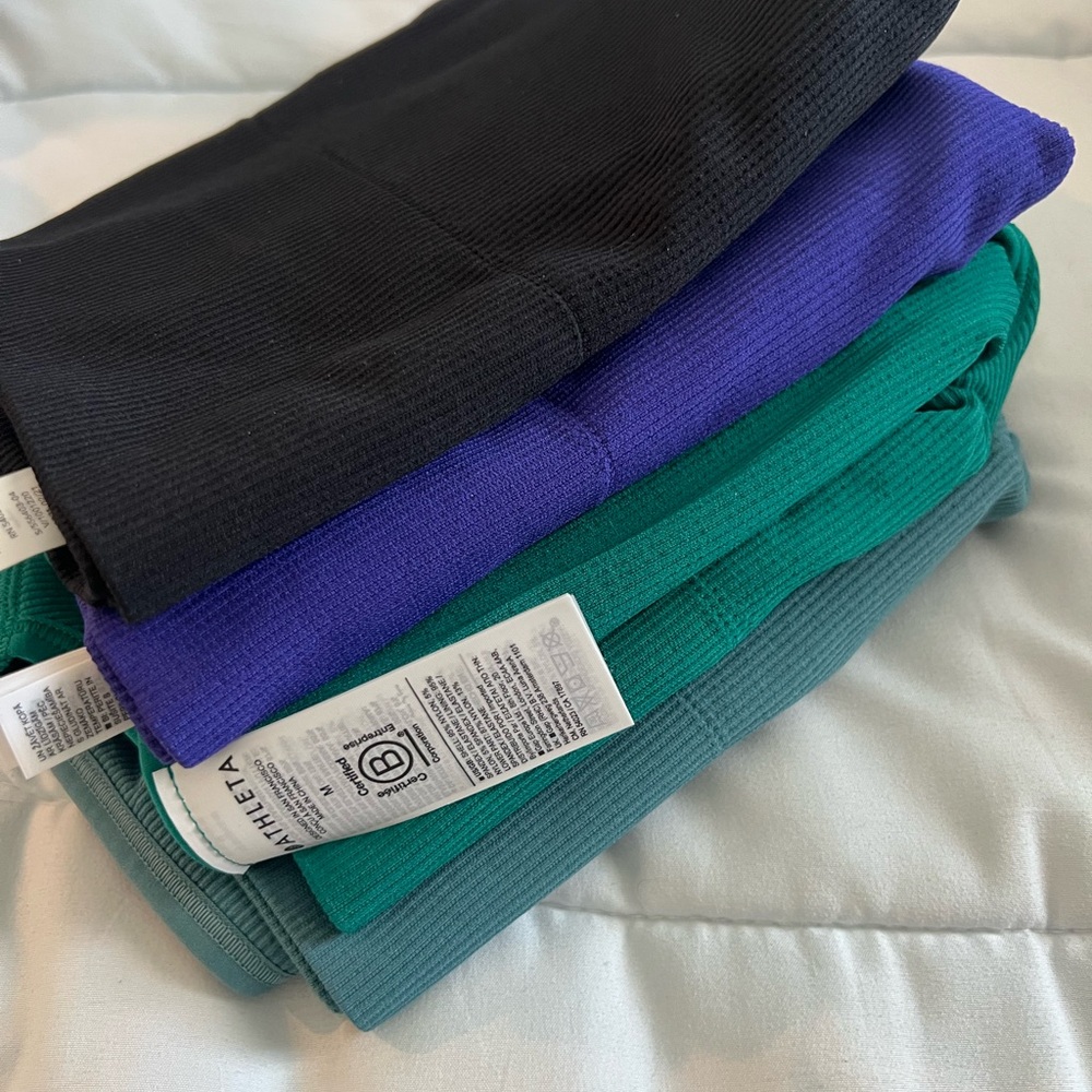 Athleta Aurora tops: Black, Purple, Green, and Teal Tops
